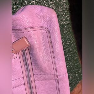 Some ink spots that show bottom slight stained but very clean inside nice purse